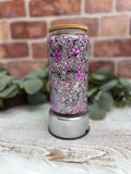 purple and black glitter, hearts, flowers, and lightning bolt decals tumbler